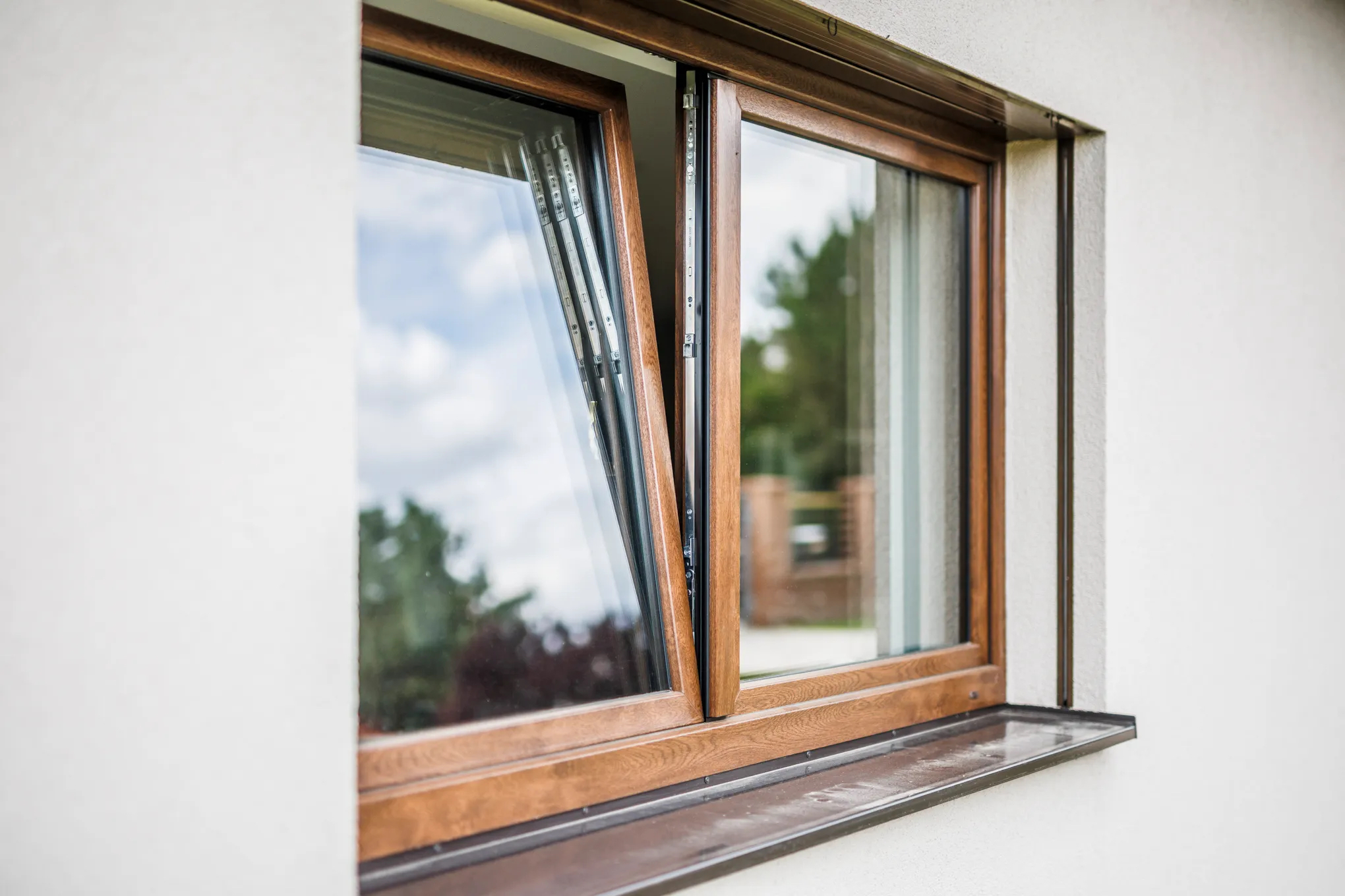 NikoVision uPVC tilt window — Golden Oak finish